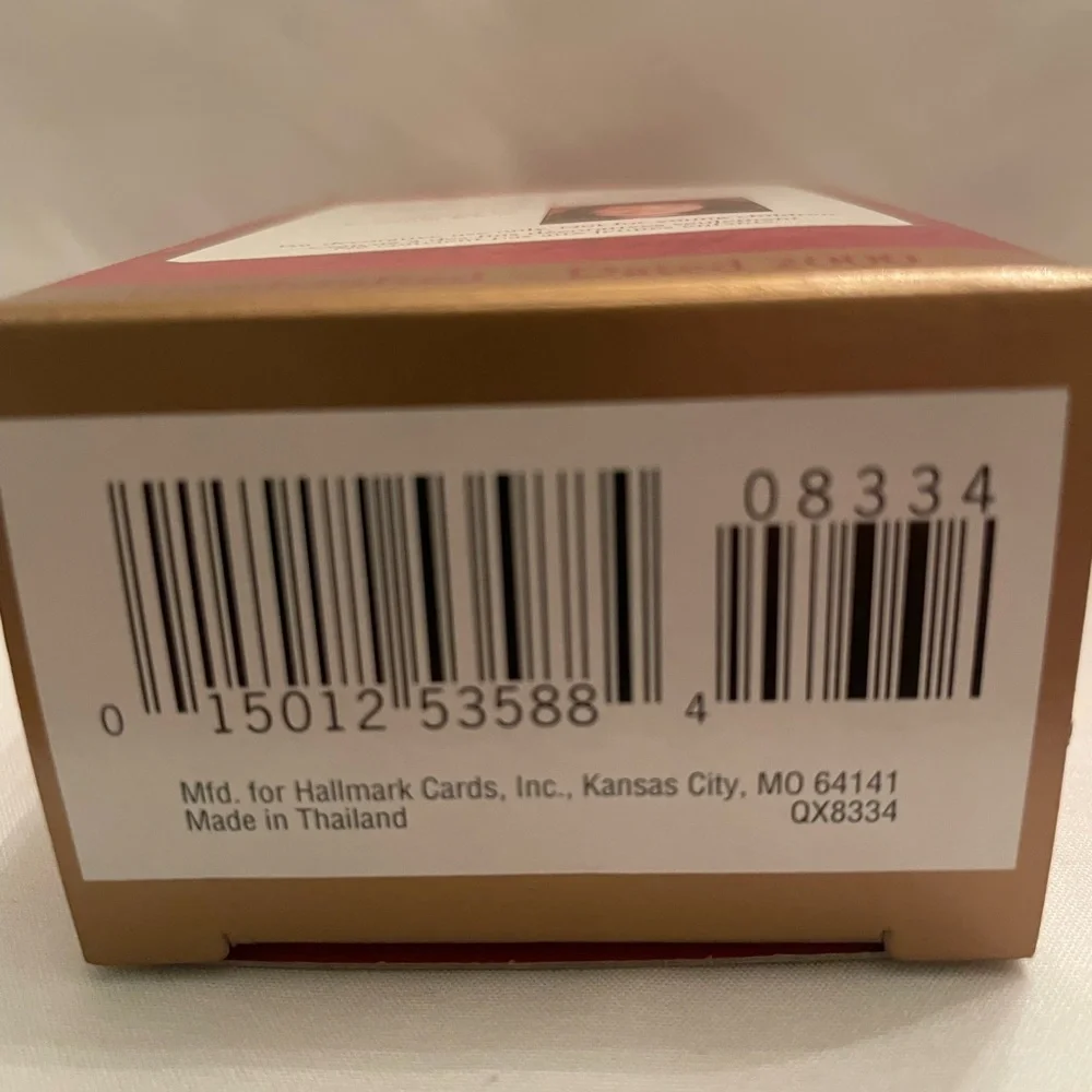 Hallmark Ornament - Girl in Teal and White with Red Accents. EUC in original box